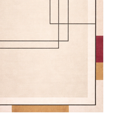 Close-up of a geometric patterned rug with a beige background