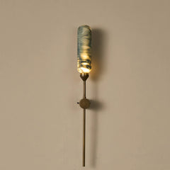 Wall Mounted outdoor light features green marble-painted glass with warmth and elegance.