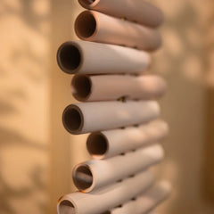Decorative Floor Lamp side profile view made of cylindrical wooden elements 