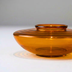 Muun Ghee Daani amber borosilicate glass pot with ridged texture, standalone side view