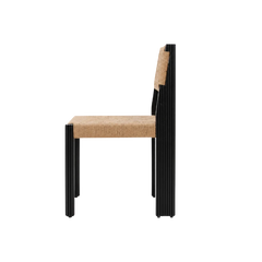 Tessa Dining Chair side profile showing fluted black teakwood legs and slim jute seat