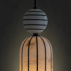 Decorative unique pendant lamp with striped design on a dark background