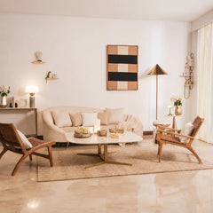 Hermes Lounge Chair with woven leather strip seat placed in a living room