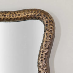 Close-up of textured aluminium frame on Luric mirror