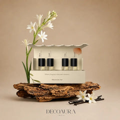 Room Perfume Discovery Set: The Mood - Open Cream Gift Box with Four Glass Vials on Tree Bark, White Flowers & Vanilla Beans, Front View