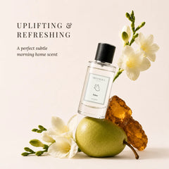 Eden - Uplifting & Refreshing Perfume Room Spray - Upright Glass Bottle on Green Pear with White Freesia & Amber, Front View