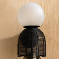 Totem Black Wall Lamp with a black woven base and white globe shade on top