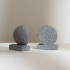 Two Monolith Concrete Bookends on a neutral background