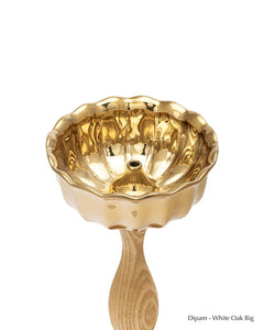 Dipam - White Oak, close-up of big scalloped brass bowl with wick holder