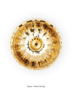 Dipam - White Oak, top view of big brass bowl interior with central wick holder