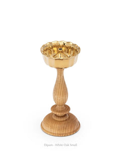 Dipam, small brass oil lamp on turned white oak stand, front view