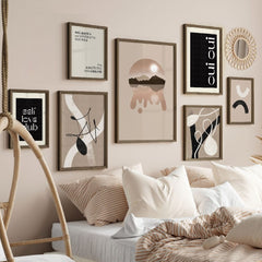 Self Love Club Designer (Set of 7) Decorative wall art prints above a bed in a bedroom setting