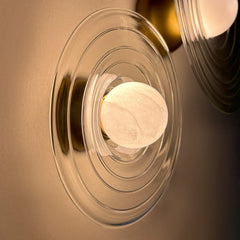 Handcrafted Ripple Effect wall sconce ambient light, material-driven wall lamp for modern interior