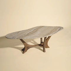 Marble coffee table with wooden legs on a beige background