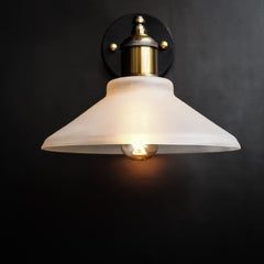 Minimalist wall lamp conical frosted glass shade Scandinavian style with bulb glowing