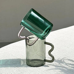 Swirl Glass Cups placed on each other in teal color