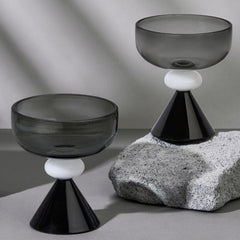 Two Twilight glass dessert bowls with a clear borosilicate glass fluted base. 