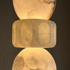 Close look of Decorative pendant lamp with a textured design on a dark background