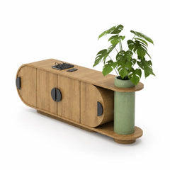A modern wooden sideboard or media console with rounded ends, featuring a green potted plant on its top surface and a matching green cylindrical side shelf, shown on a clean white background.