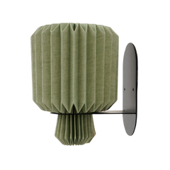 A wall-mounted lamp with a green, origami-inspired linen shade and a metallic bracket.