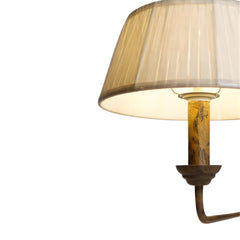 Designer chandelier with a beige lamp shade 