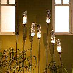 Outdoor floor lamp with black and white marble-painted glass. Hand-finished casting a soft, refined ambient glow.