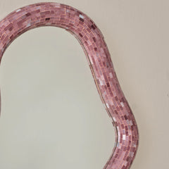 Close view of wall mirror handcrafted with pink glass mosaic