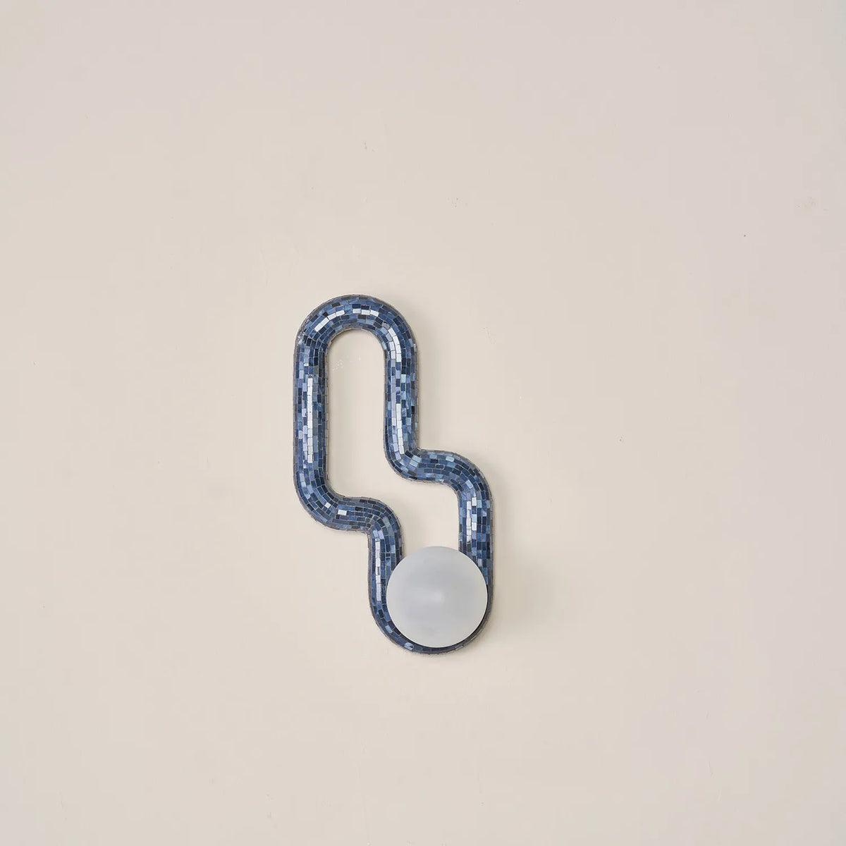 Decorative wall sconce with glass mosaic and gradients of blue