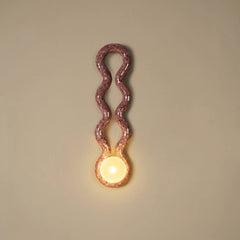 Decorative Reva Triple loop wall light in pink mosaic with wavy glass design on a beige background