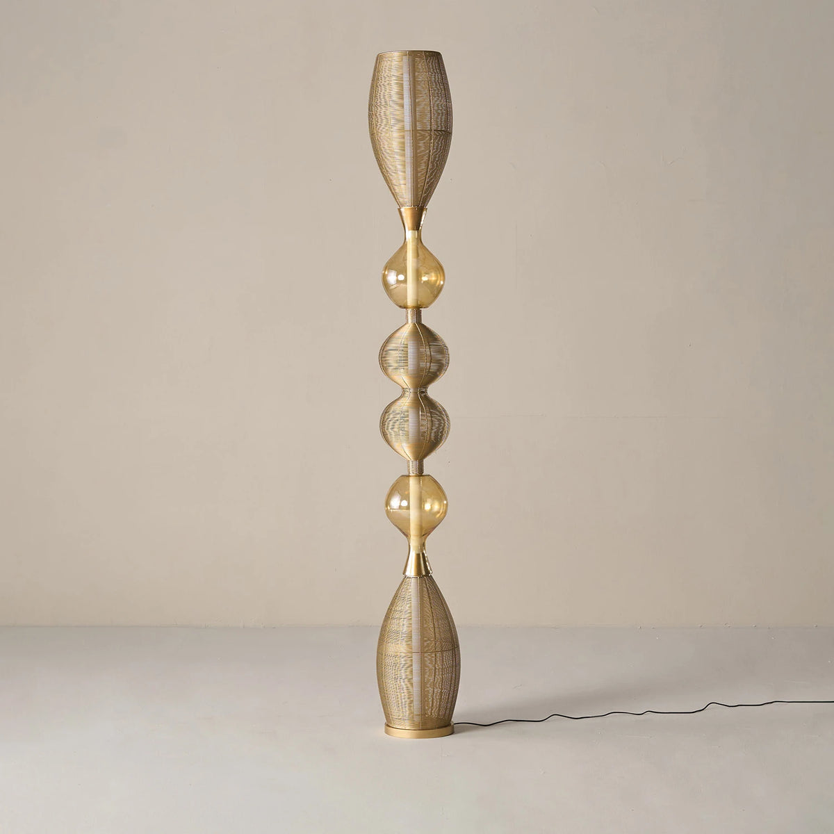 Decorative Notto floor lamp with a unique design crafted in glass & mild steel