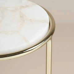 Round marble table with gold rim
