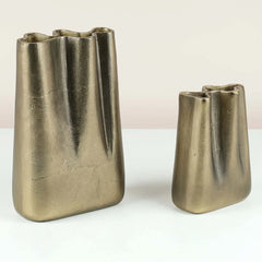 Two metallic Peru Vases made of aluminum with textured surface.