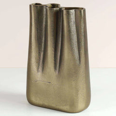 Unique style bronze-colored peru vase with a textured surface.