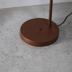 Study Task Table Lamp, close view of iron material lamp base with copper finish