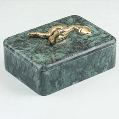 Green marble jewelry box with a gold snake design on a white background