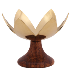 Lotus Blossom - A brass tea light holder designed to resemble a lotus flower, with petals shaped leaves and a wood finish base.