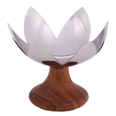 Decorative Lotus Blossom, chrome-finished metal tea light holder made of stainless steel, mounted on a wooden base. 