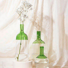 Iris vases in 3 unique designs, made of glass with green color on top and clear base