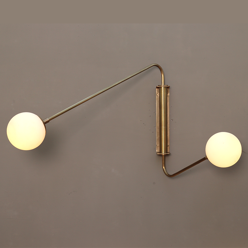 Float two arm wall sconce glass globe\ Wall light\ Swivel light\ Adjustable light\ Wall lamp\ Wall mounted\ Bedroom light\ Living room light\ Office light\ Brass finish