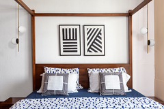 Debonair Brass-Gold hanging lights, installed on both sides of bedroom