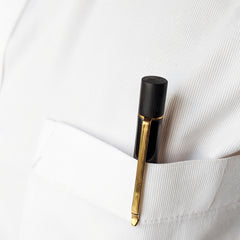 Close view of Oronoir Pen placed inside the front pocket of white shirt
