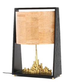 Side look, City of Light table lamp with a brass cityscape base and a cork sheet shade and wood finish stand.