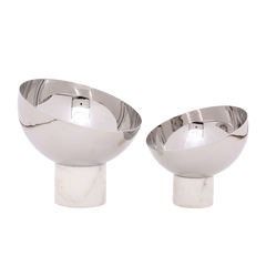 Two stainless steel Para Bowls with marble bases on a white background