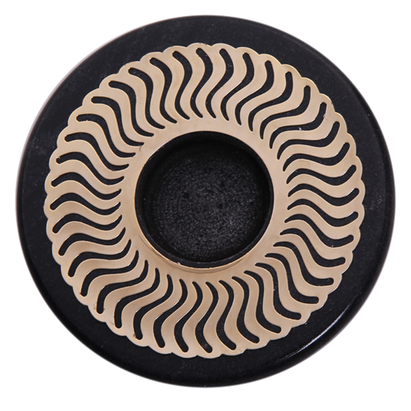 A round decorative Celestial - Black Plate with a black marble base and a gold celestial pattern sticker in the center.