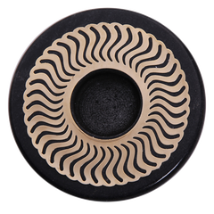 A round decorative Celestial - Black Plate with a black marble base and a gold celestial pattern sticker in the center.