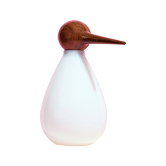 A white hand-blown Chirp glass jar shaped like a bird with a wooden beak.