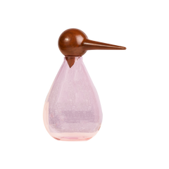 A bird-shaped hand-blown decorative glass jar with a pink body and a brown beak made of wood