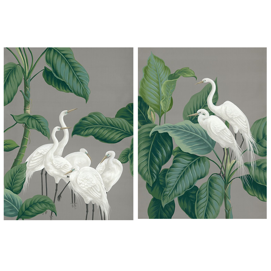 Two framed paper crane design wall art prints surrounded by foliage.