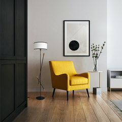 Teak Bud Floor Lamp, minimalist metal silhouette with teak wood accents styled in a living room.
