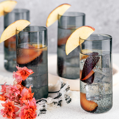 Juliette Cocktail Glasses - Grey, set of 4 with drink and decorated with apple
